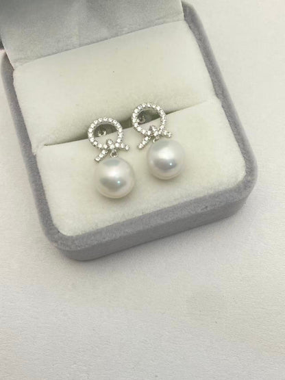 Eternal Knot Lustrous Pearl Earrings in 925 Silver