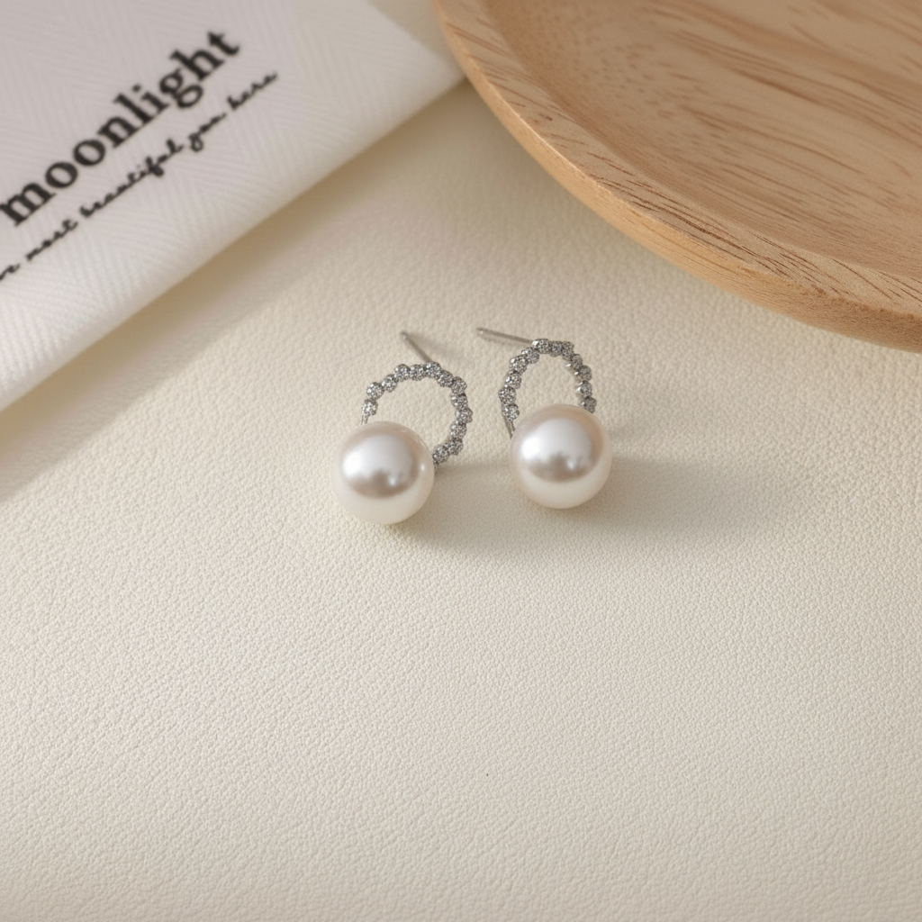 Quiet Glow Akoya Pearl Studs in White Gold and Diamond